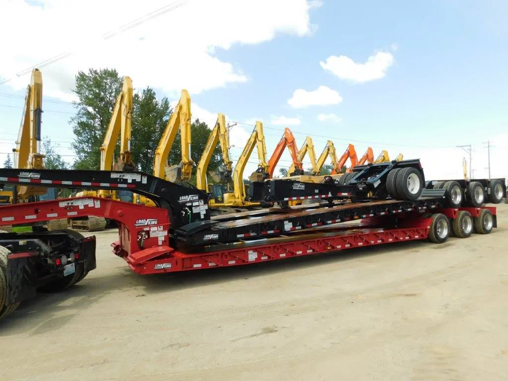 Load King lowboy trailer with equipment